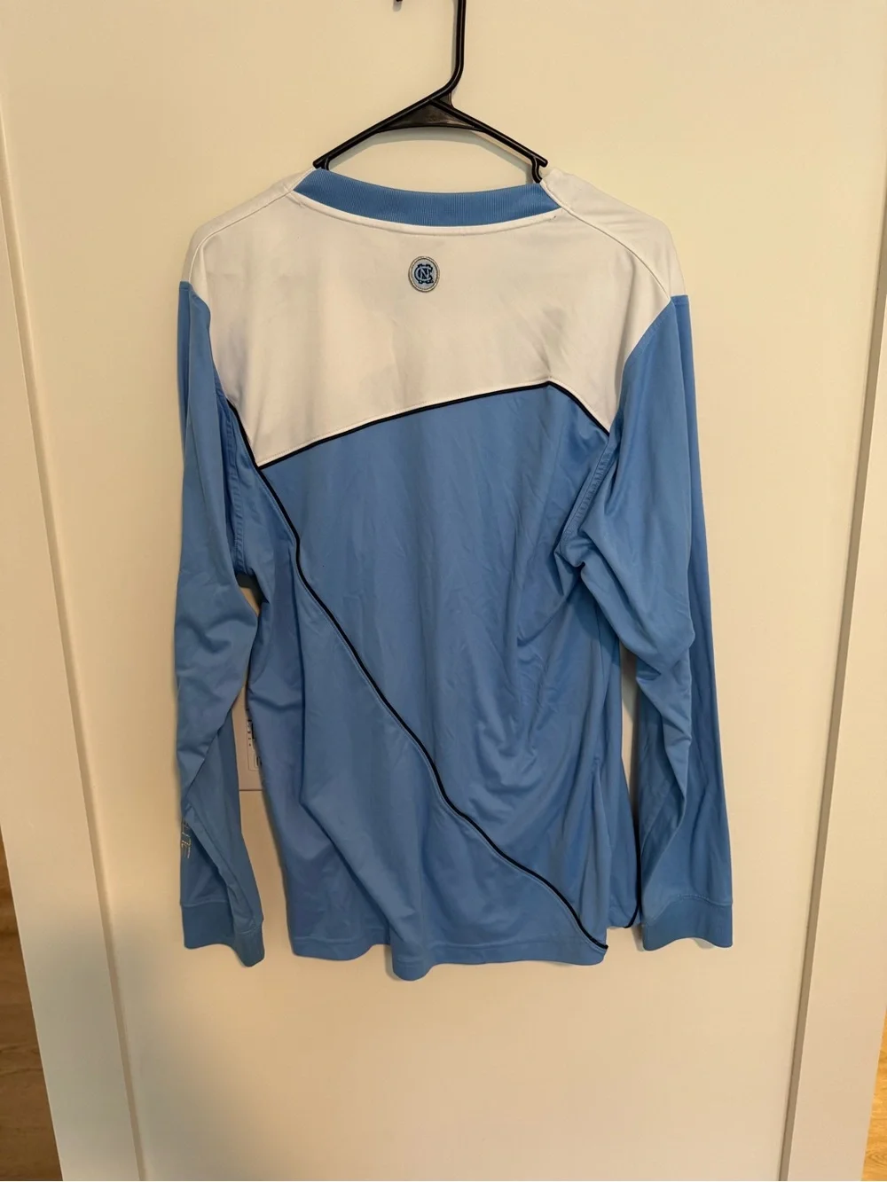 UNC 2010s Jordan shooting shirt. Light Blue Long-Sleeve Performance Shirt